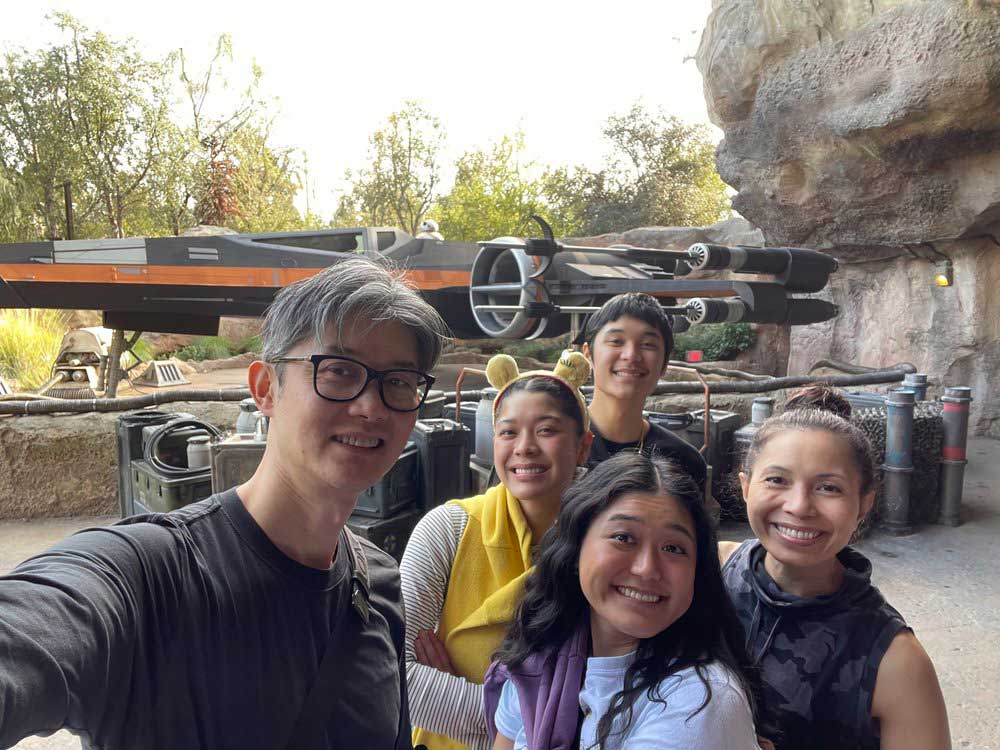 Dr. Tran and his family at Disneyland